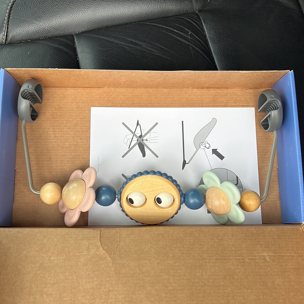 New BabyBjorn Toy Bar for Bouncer. Box slightly damaged.